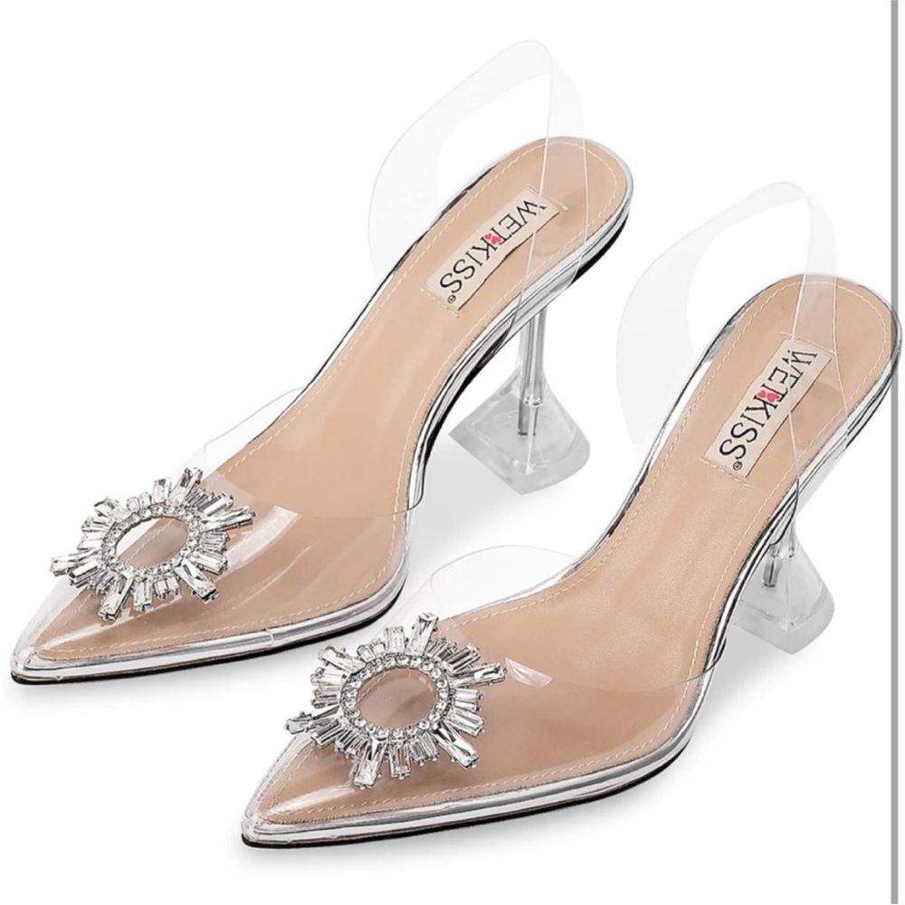 Wet Kiss clear sling backs with rhinestones size 7.
New in box!